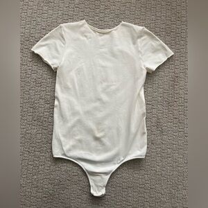 SKIMS Cream Thong Bodysuit